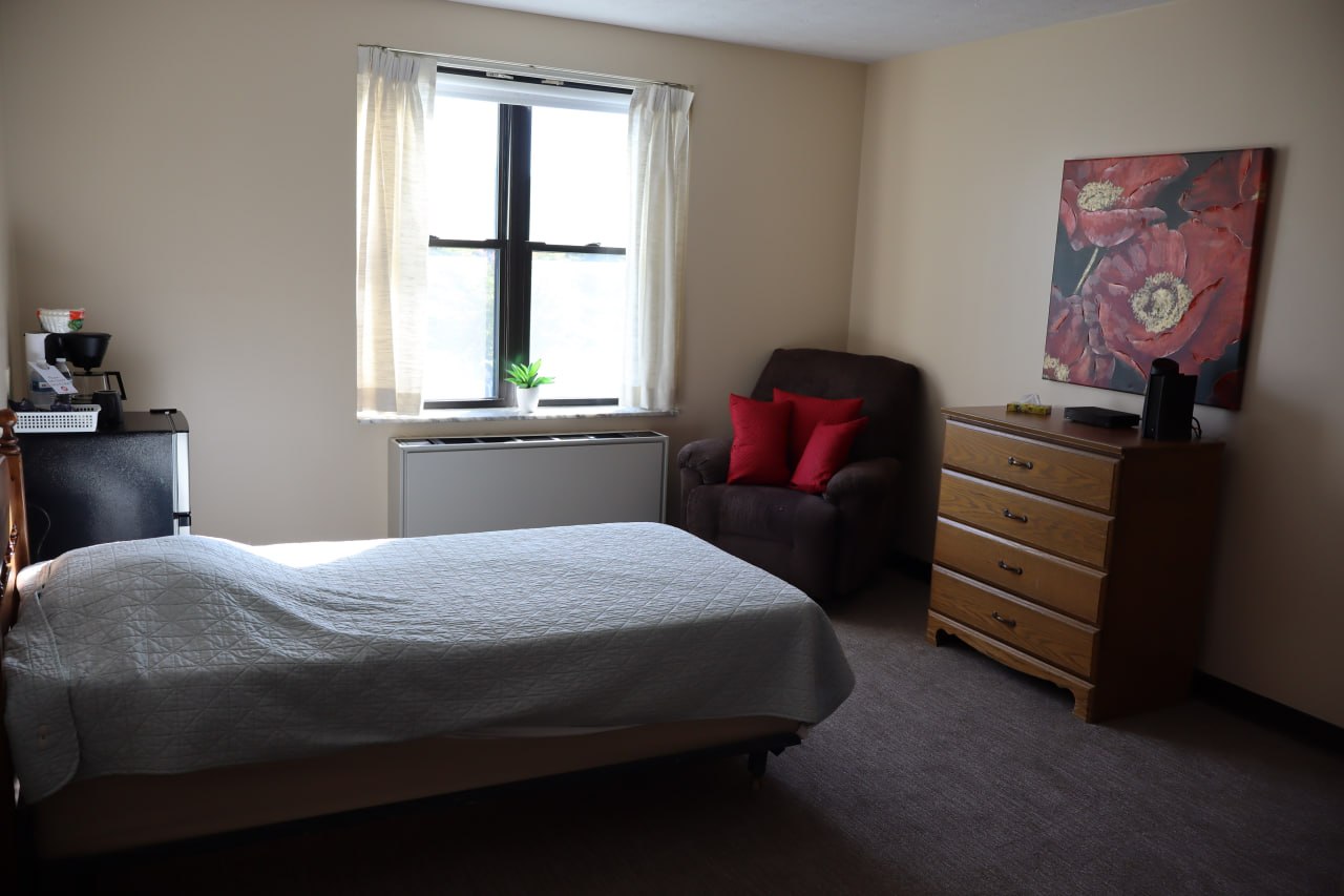 Studio Plus Assisted Living Apartment - Enhanced layout with sitting area
